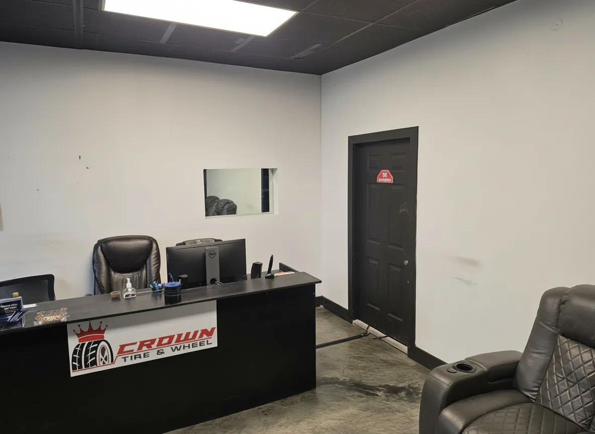 Front desk with the Crown Tire & Wheel logo